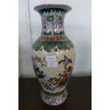 An oriental style porcelain vase, 46cms h