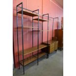 A teak and steel room divider