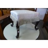 A Victorian rosewood footstool