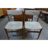 A pair of Danish Erik Buch teak chairs