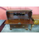 A George III mahogany secretaire chest of drawers