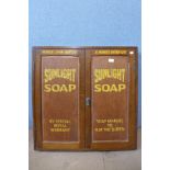 An oak wall hanging cabinet, bearing Sunlight Soap inscription to doors, 76cms h x 76cms w