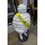 A cast iron Michelin Tyres advertising figure