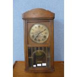 An oak wall clock