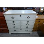 A French style painted oak chest of drawers