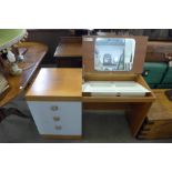 A teak dressing table, oak washstand and a walnut bookcase