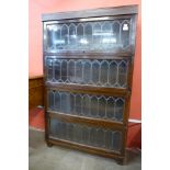 An early 20th Century Globe Wernicke oak four tier sectional stacking bookcase