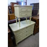 A French Louis XV style cream and parcel gilt chest of drawers and matching bedside chest