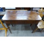 A George III inlaid mahogany fold over card table