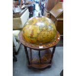 A terrestrial globe cocktail cabinet