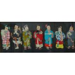 A Japanese textile depicting seven figures, framed, 34 x 62cms