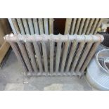 Three Victorian cast iron radiators