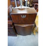 A walnut cocktail cabinet