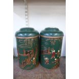 A pair of oriental style green chinoiserie ginger jars and covers