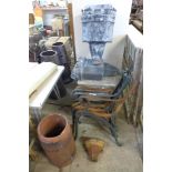 A pair of lead drain hoppers, a terracotta chimney-pot, two pairs of bench ends and one other