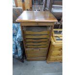 A beech tambour front filing cabinet (signs of old woodworm)