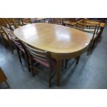 A Nathan teak dining table and four chairs