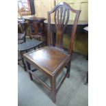 A George III elm and mahogany chair