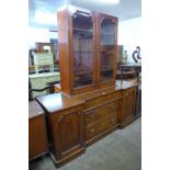 A Victorian mahogany breakfront sideboard and a mahogany bookcase top