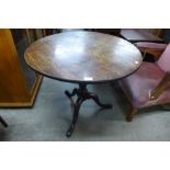 A George III mahogany circular tripod tea table