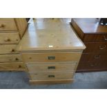 A pine three drawer plan chest