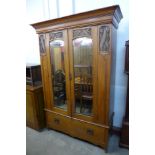 A Victorian satin birch wardrobe