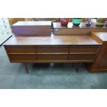 A small teak sideboard