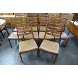 A set of ten teak dining chairs