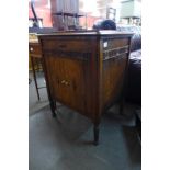 An oak gramophone cabinet, parts and records, etc.