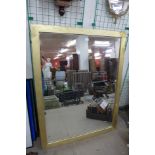 A gilt framed mirror