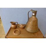 Two copper jugs and a spirit kettle