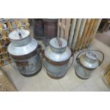 A set of three graduated aluminium milk churns