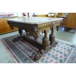 A 19th Century Flemish carved oak two drawer centre table