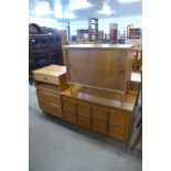 A Nathan teak side cabinet and matching TV stand and a small teak two door cabinet