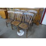 A set of six Victorian elm and beech kitchen chairs