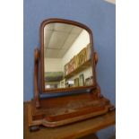 A Victorian walnut toilet mirror