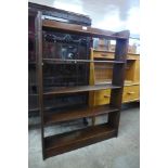 A mahogany open bookcase