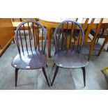 A pair of Ercol dark Windsor chairs