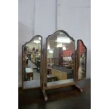 An oak barleytwist sewing table, a walnut dressing table mirror an occasional table and a