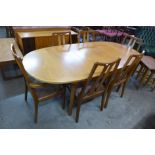 A Nathan teak extending dining table and six chairs