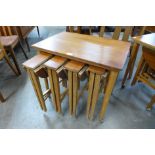 A teak nest of tables