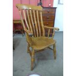 A Victorian elm and beech farmhouse armchair