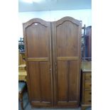 A beech fitted wardrobe