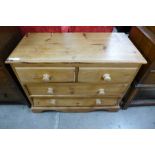 A pine chest of drawers