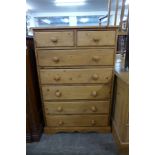 A pine chest of drawers