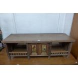 A Victorian Aesthetic Movement desk top cabinet, 41cms h x 119cms w