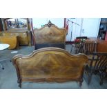 A 19th Century French Louis XV style walnut double bed, 146cms h, 150cms w, 207cms l