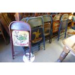 A set of six painted advertising metal folding chairs