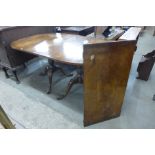 A Regency style mahogany pedestal dining table