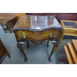 A George I style burr walnut serpentine side table